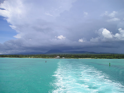 blue body of water under white clouds at daytime thumbnail