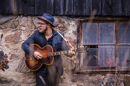 Man Playing Guitar thumbnail
