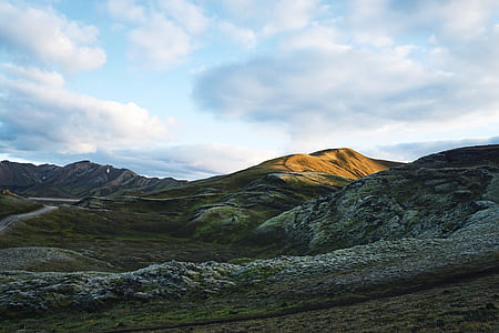 green and brown mountain under white sky thumbnail