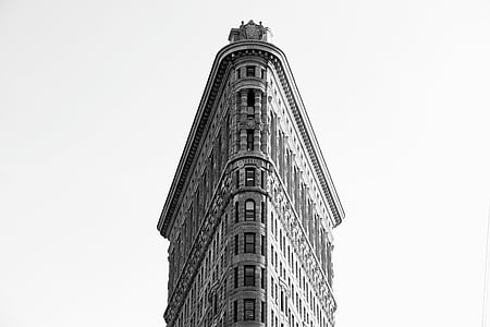 gray painted triangular building thumbnail