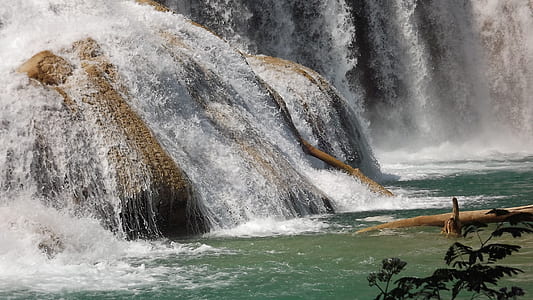 photography of water falls during daytime thumbnail