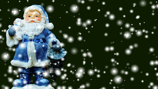 santa wearing blue outfit ceramic figurine thumbnail