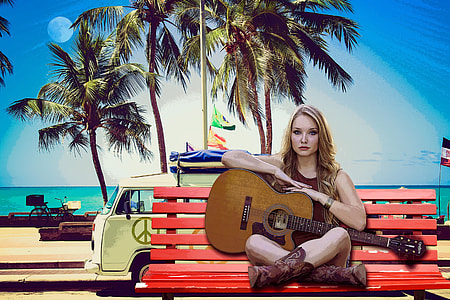 Female Guitar player sitting on bench thumbnail