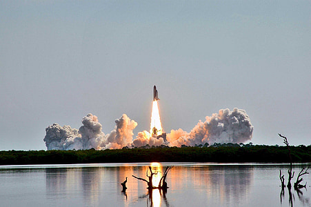 rocket launching near body of water thumbnail