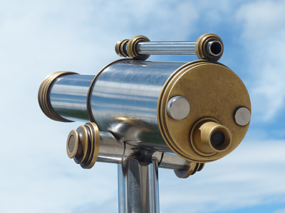 closeup photo of gold-colored scope thumbnail