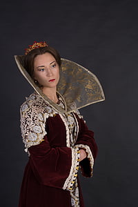 woman wearing maroon dress with Elizabethan collar on neck thumbnail