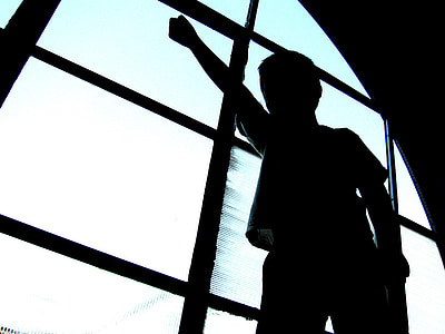 silhouette of person near window thumbnail
