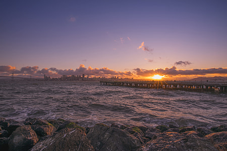 body of water waving during sunset thumbnail