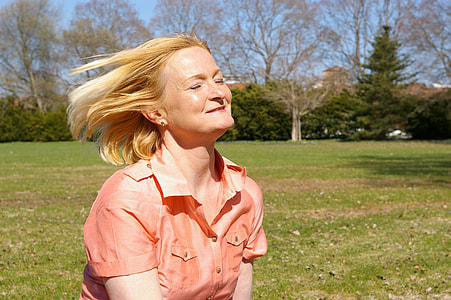 time-lapse photography of woman flipping her hair outdoor thumbnail