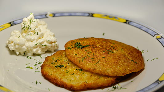 fried pancakes on white ceramic plate thumbnail