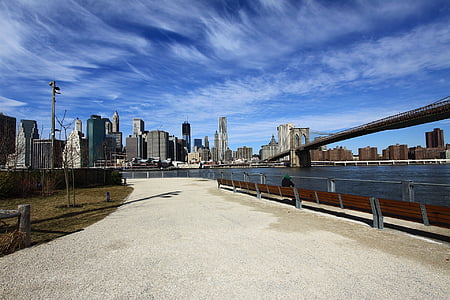 landscape photography of bridge under blue sky during daytime thumbnail