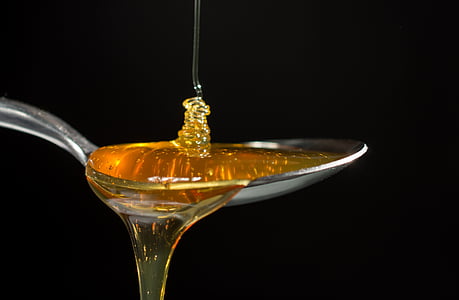 honey on stainless steel spoon thumbnail