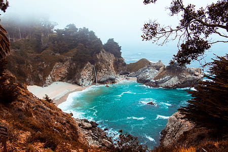 island under white clouds thumbnail