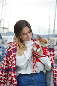 woman holding chihuahua thumbnail