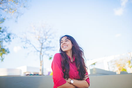smiling woman with her hands crossed thumbnail