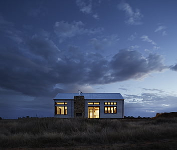 white and brown house at daytime thumbnail