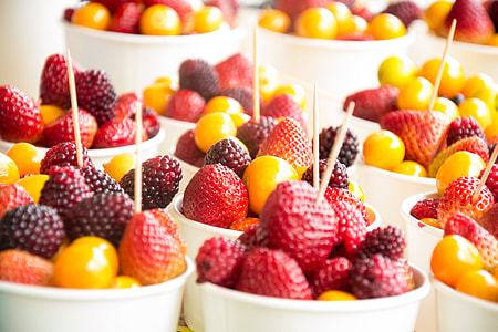 assorted-kinds of berries inside disposable cups thumbnail