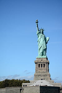 Statue of Liberty statue under blue sky thumbnail