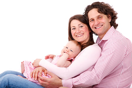 photo of man behind woman carrying baby thumbnail