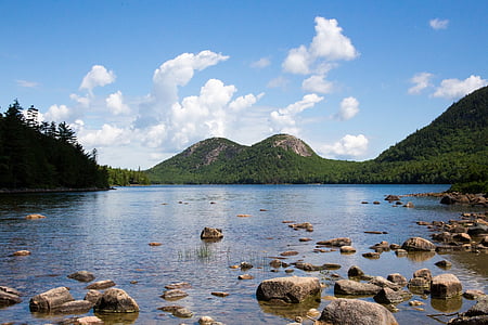 stones on body of water thumbnail