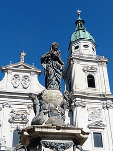 statue in front of church thumbnail