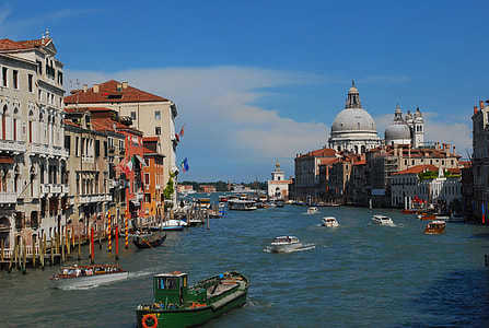 view of boats sailing in Venice Canal during day time thumbnail
