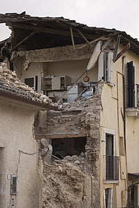 wrecked beige concrete house thumbnail