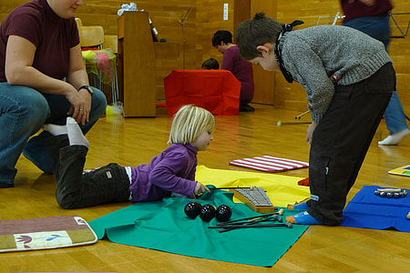 boy and girl playing glockenspiel on parquet floor thumbnail