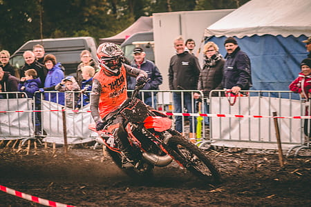 man riding motocross dirt bike thumbnail