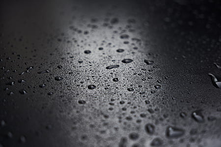 water dew on black surface thumbnail