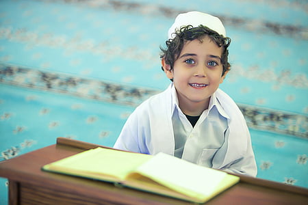 boy wearing white button-up top thumbnail