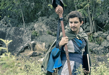 Man Holding Staff thumbnail