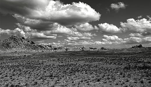 Grey Scale Photography of Open Field and Mountain thumbnail