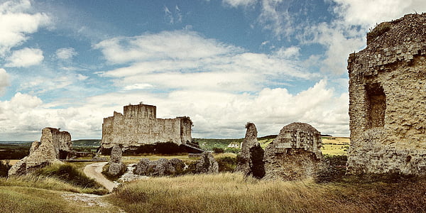 beige concrete ruins on field thumbnail
