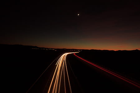 timelaps photo of car light during nighttime thumbnail