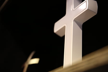 selective focus photography of white cross thumbnail