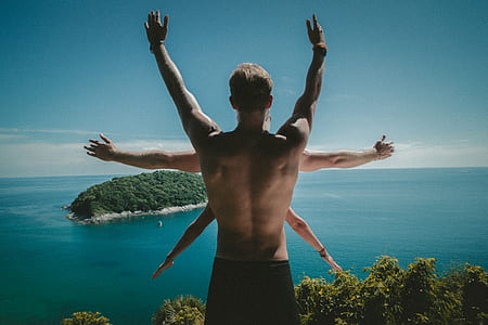 photo of man facing island thumbnail
