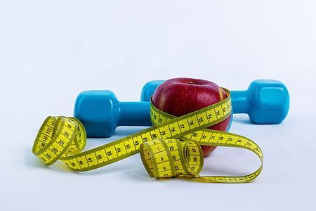 honeycrisp apple wrap by yellow measuring tool near dumbbells thumbnail