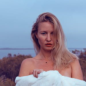 woman in white top thumbnail