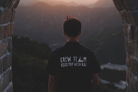 person wearing black Crew Tech crew-neck t-shirt thumbnail