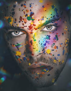 focus photography of man with glittered effects thumbnail