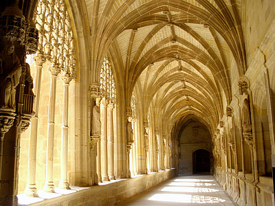 architectural photography of brown hallway at daytime thumbnail