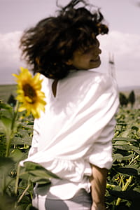 Photo of Woman on Sunflower Field thumbnail