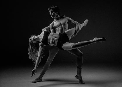 grayscale photo of man and woman dancing thumbnail