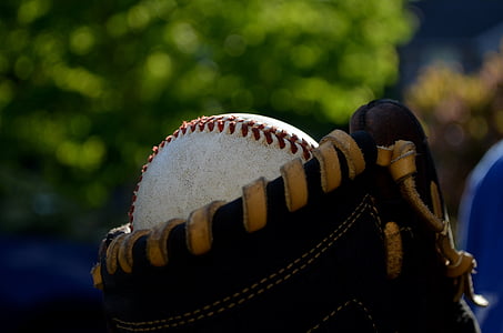 man holding baseball thumbnail