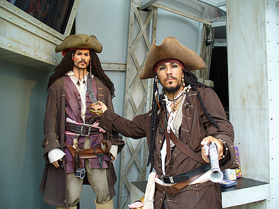 two men wearing Jack Sparrow costumes thumbnail