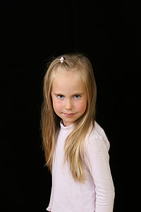 girl wearing white long-sleeved shirt with black background thumbnail