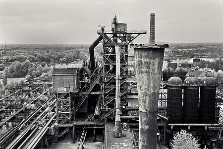 grayscale photography of industrial building thumbnail