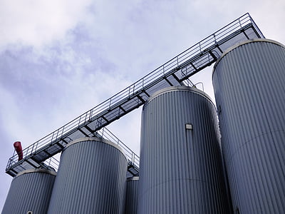 gray storage silos during daytime thumbnail