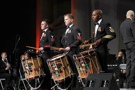 three men plating drums thumbnail